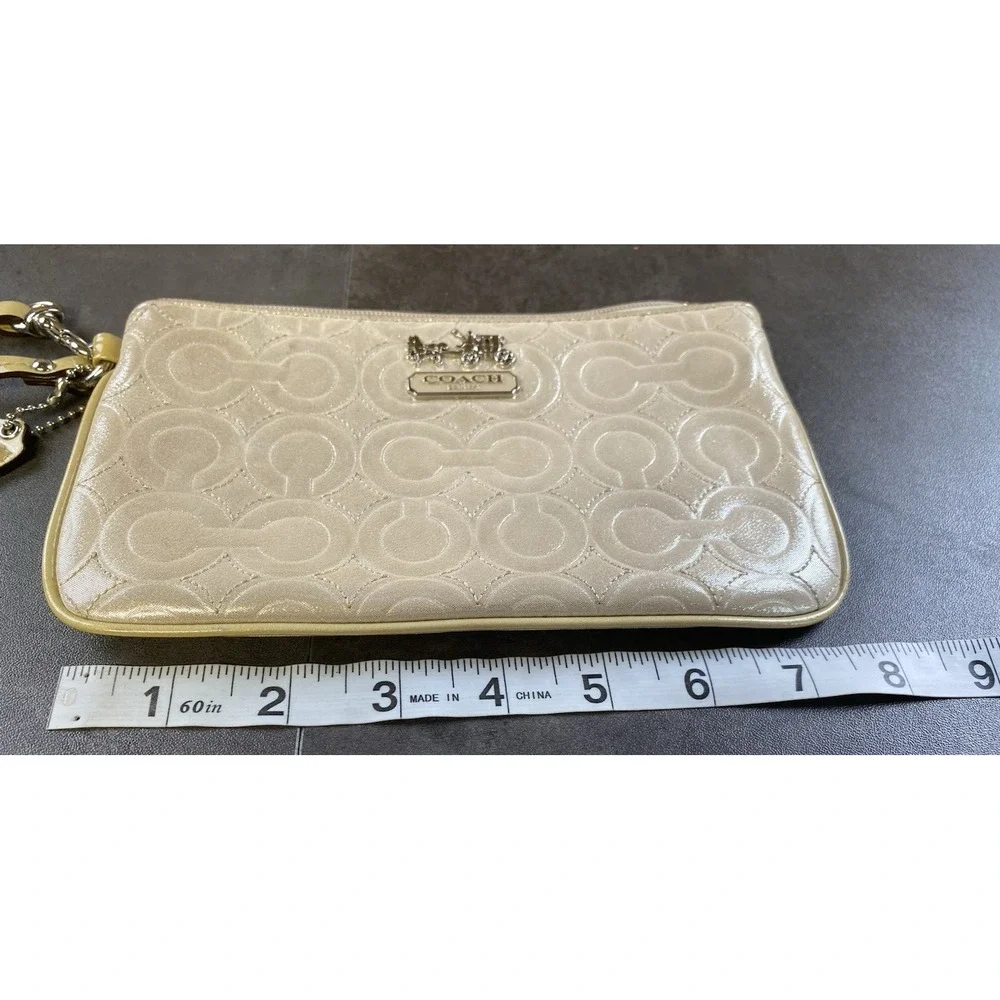 Coach Signature C Metallic Beige Wristlet w/ Purple Satin Interior